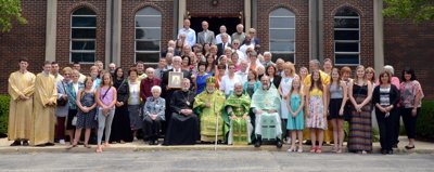 Bishop Paul visits St Nicholas Church Joliet IL honors Fr John E Kuchta