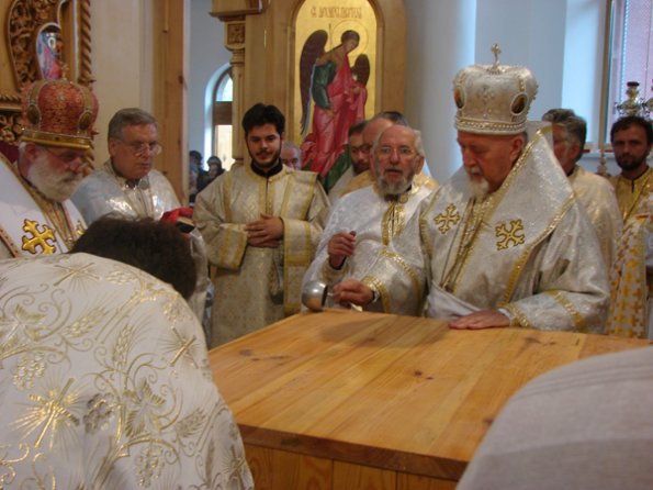 Archbishop JOHN seals the altar